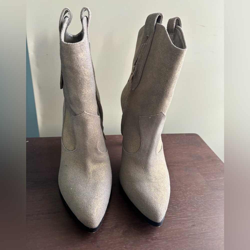 Tan and gold ankle boots.